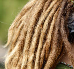 A woman with long, curly hair