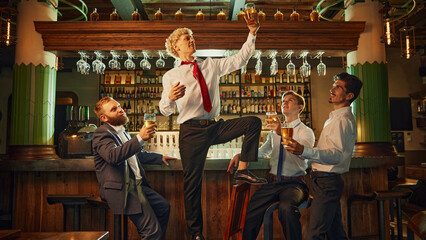 Group of men relax at bar, engaging in lively conversation and laughter while enjoying their drinks, fostering camaraderie.
