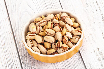 Salted tasty pistachio nuts heap