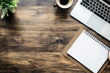 Minimalist Workspace with Laptop and Notebook