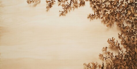A wooden surface with dried leaves arranged along the edge, creating a natural aesthetic.