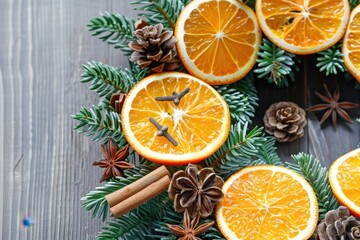 Rustic Christmas Wreath with Dried Oranges and Pine Cones on Wooden Table