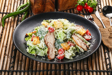 Caesar salad with chicken and romano