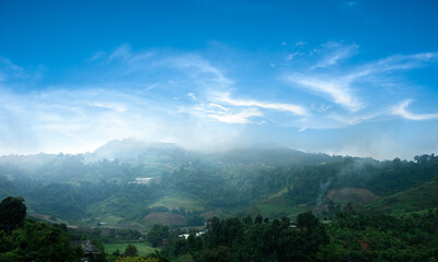 Beautiful mountains and villages against a sunny and blue sky