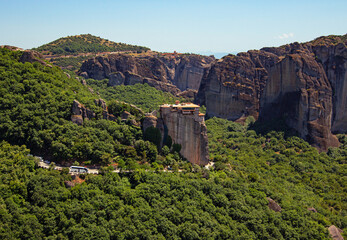 Holy Monastery of Rousanos (or Rousanou), Saint Barbara on the very top of the sandstone rock as seen from the terrace of Varlaam monastery near city of Kalambaka, Trikala region, Greece