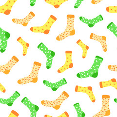 Vector pattern with colorful cute yellow, orange, green socks