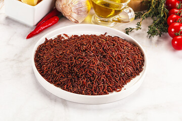 Red raw dry rice gor cooking