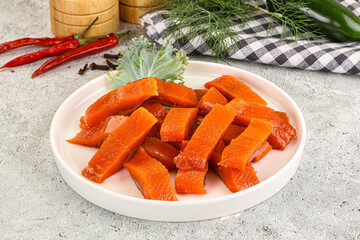 Red pickled herring fish fillet