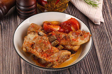 Baked lamb ribs with vegetables