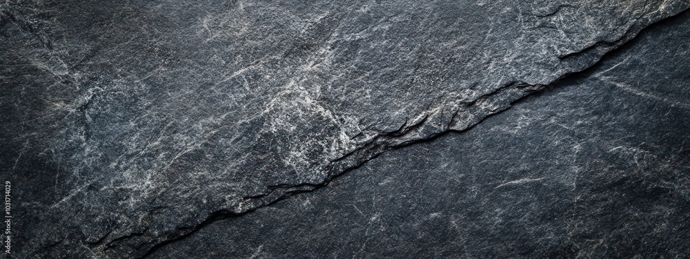 Poster a close-up view of textured dark slate stone with natural patterns and lines.