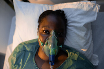 African girl with a face mask in the hospital.
