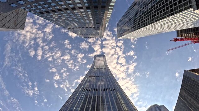 High rise urban buildings, modern high-end office buildings, and commercial office buildings in Beijing, China，Urban time-lapse photography, busy city life