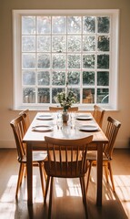 110. An empty dining table set in a bright room