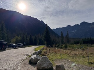 landscape in the morning, Charming mountain landscape in autumn at Morskie Oko, featuring vibrant trees and a serene lake. Ideal for outdoor exploration and tranquility.