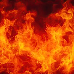 Fototapeta premium Flames of fire in a bright orange hue, creating an abstract pattern against a dark background.