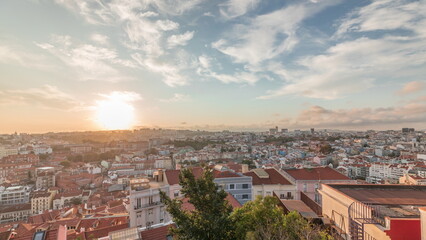 Fototapeta premium Panorama showing Lisbon famous aerial view from Miradouro da Senhora do Monte tourist viewpoint timelapse