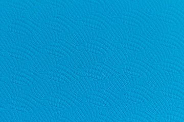 Blue background with wavy convex texture
