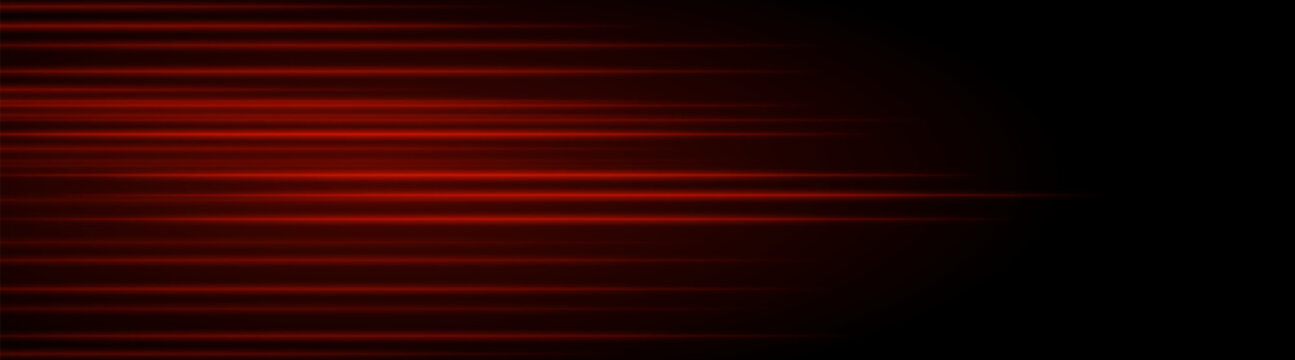Abstract red laser beam. Lighting effect. Directional spotlight. Light streaks fading into darkness on a black background, creating a dynamic and abstract effect.