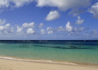 Paradise tropical beach with turquoise lagoon, horizon over the sea, sunny weather and sand....