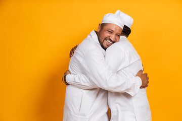 Happy Indian Muslim Men Hug each other celebrating Eid