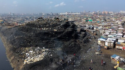 Ghana, Accra,   AGBOGBLOSHIE drone view Odaw River the largest landfill illegal dump in Africa for...
