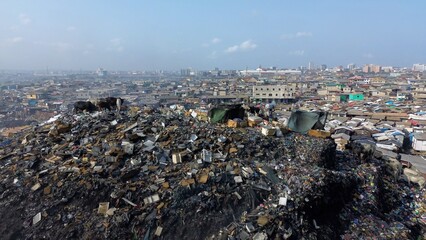 Ghana, Accra,   AGBOGBLOSHIE drone view Odaw River the largest landfill illegal dump in Africa for...