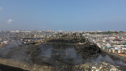 Ghana, Accra,   AGBOGBLOSHIE drone view Odaw River the largest landfill illegal dump in Africa for...