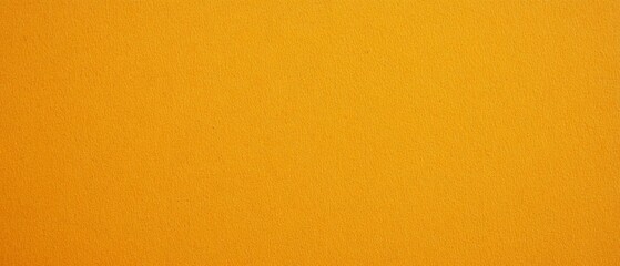 Obraz premium Bright yellow plain paper texture with a smooth finish