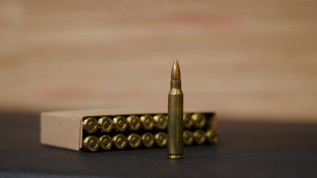Left rotation around the ammo while keeping it centered.