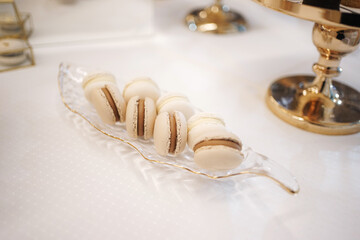 A sweet buffet table with cakes and pastries.