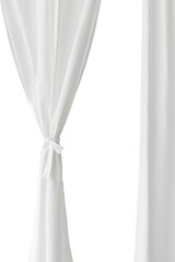 White drapery hanging from a curtain rod design element