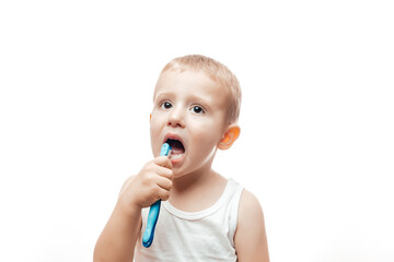 child boy with clean teeth brushing on a white background
