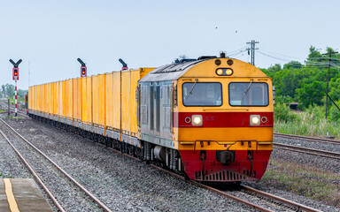 Obraz premium freight Container train num 608 at Saraburi, Thailand 