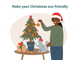 Sustainable Christmas concept. Woman decorating potted Christmas tree. Eco friendly Christmas.