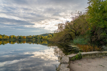 Vibrant Autumn Trees Turning Orange and Yellow by Max-Eyth Lake in Stuttgart