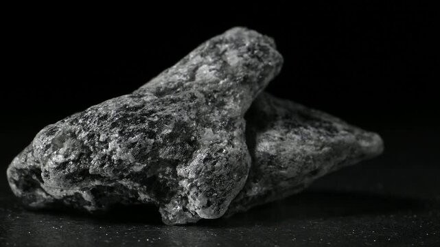 Talc (hydrated magnesium silicate - Mg3Si4O102) sample rotating slowly against a black background [Norway]