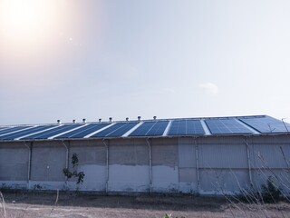 Solar photovoltaic panel system in Industry roof. Saving Energy with Clean Power. Technology of Solar panel for green industry.