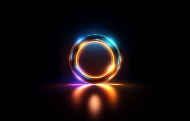 Naklejka premium A glowing, multi-colored circular shape sits in the center of a black background. Its light reflects on the surface below.