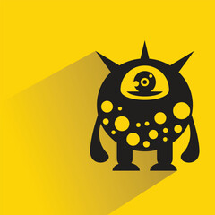 funny monster character with shadow on yellow background