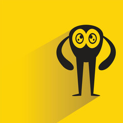 funny monster character with shadow on yellow background