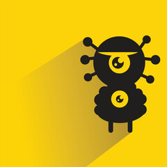 funny monster character with shadow on yellow background
