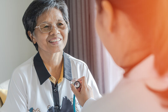 Elderly patient heart health check by medical geriatric doctor for awareness in stroke systolic high blood pressure, hypertension, hypotension and cardiovascular disease in aged senior older woman