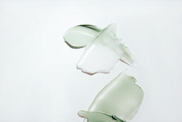 Cosmetic samples texture. Different smears on a white background