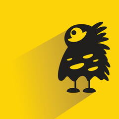 funny monster character with shadow on yellow background