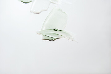 Cosmetic samples texture. Different smears on a white background. Copy space