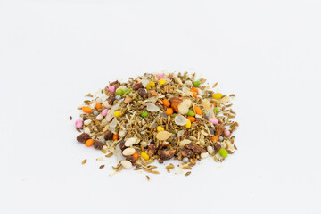 Close-Up of Colorful Traditional Mouth Freshener and Digestive Spice and Seed Blend on White Isolated Background. They are Traditionally Served at the End of the Meal.