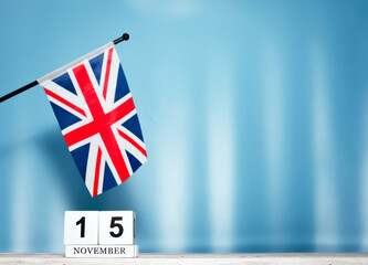 Fototapeta premium November Calendar With British Flag With Number 15. Calendar cubes with numbers. Copy space.