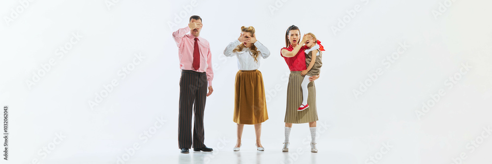 Wall mural three people, including young girl, covering their eyes in synchronized gestures, playing with the i