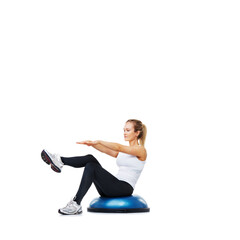 Woman, workout and sitting on half ball for exercise, fitness or training on a white studio background. Active female person on balance object for pilates, practice or strong core on mockup space