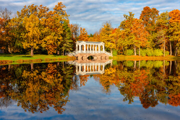 Marble bridge in autumn foliage in Catherine park, Pushkin (Tsarskoe Selo), Saint Petersburg, Russia